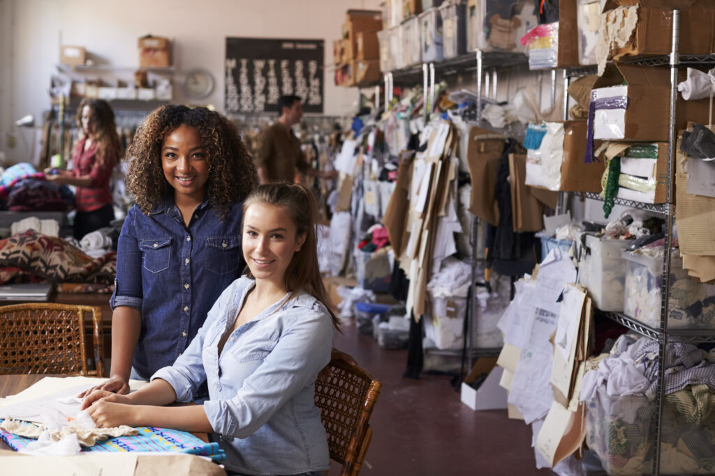 Even if you're a startup on a limited budget with few employees, like these two female entrepreneurs; you should still work on your employee handbook. 