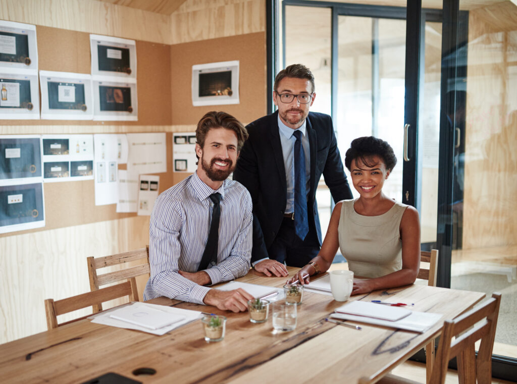 A team working on their HR strategy, despite a limited budget focussing on the ROI of HR. 